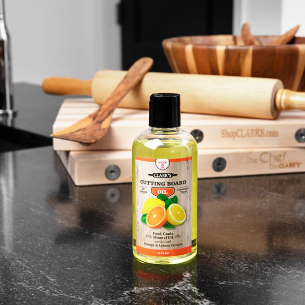 clark's cutting board oil being used on a cutting board on a counter