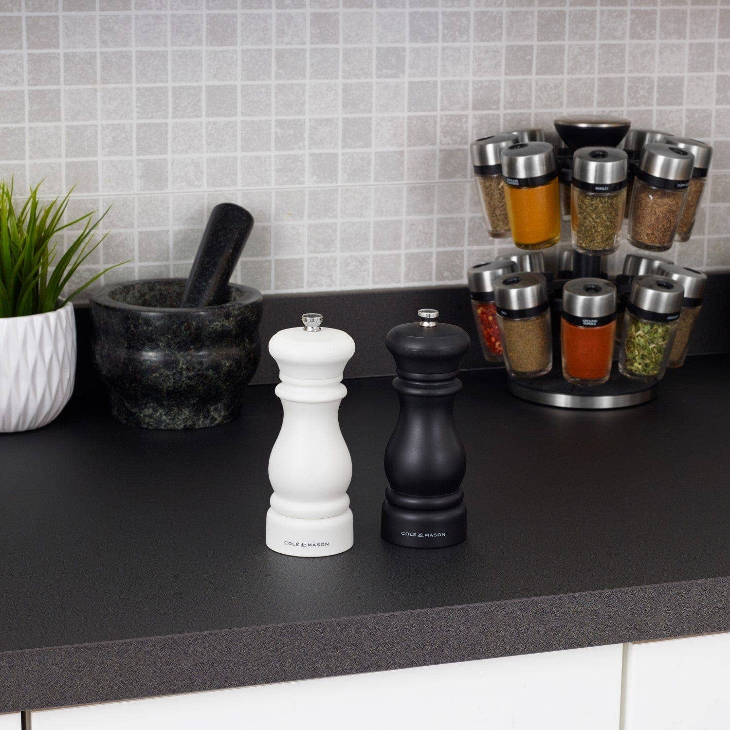 A classic salt and pepper mill set crafted from durable ABS, designed to bring both style and functionality to your kitchen. Perfect for everyday use, these mills feature a high-quality grinding mechanism that delivers consistently exceptional performance.