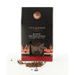 Box of Cole & Mason black peppercorns on a white background
