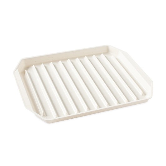 Rectangular white tray with slotted design on a white background