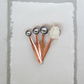 Set of 4 Copper finish stainless steel measuring spoons by Creative Co-Op spread out top view