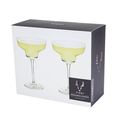 With sleek, modern angles, this margarita coupe offers a contemporary twist on a classic design, making it the perfect companion for a frothy, frozen margarita on a hot summer evening. Crafted from lead-free crystal, each glass holds 12 ounces and comes in a set of two. For lasting brilliance, hand washing is recommended.