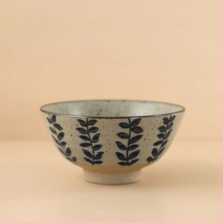 Stoneware hand painted bowl in  a vine pattern