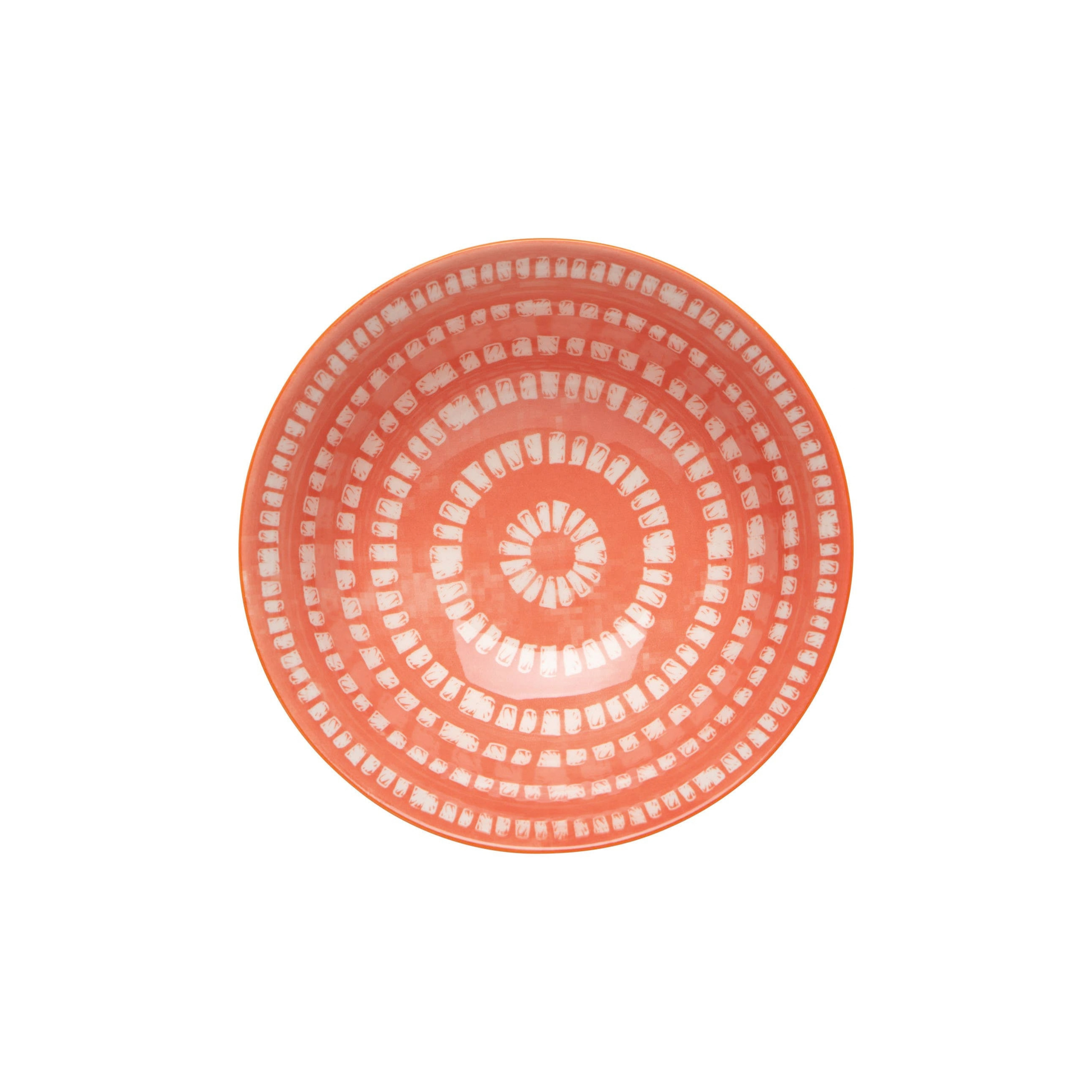Coral-colored plate with a circular pattern on a white background