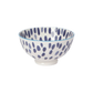 White bowl with blue spotted pattern on a white background