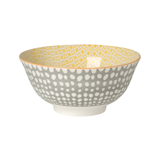 Decorative bowl with a patterned design on a white background