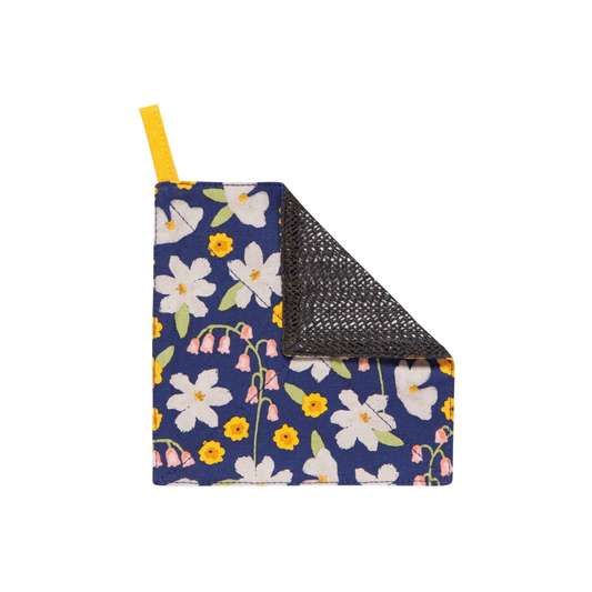 Floral-patterned mat with a yellow handle on a white background