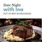 Filet of beef bourguignon on a plate with mashed potatoes, garnished with herbs, on a blurred background.