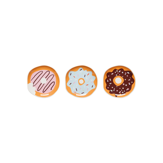 Sweeten up your table with this set of three donut-shaped dishes, featuring pink frosted, blue frosted with sprinkles, and chocolate frosted designs. Whether you're serving appetizers, desserts, or using them as trinket trays, these whimsical plates add a fun-loving touch to any occasion. 