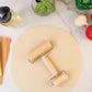 The Double Dough Roller is the perfect tool for baking, with a large roller for quick spreading and a small roller for smoothing edges. It's made of durable materials and is easy to clean. A must-have for every baker!