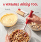 Red spatula mixing cookie dough with text indicating versatility in baking.