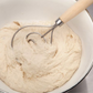 The Mrs. Anderson's 15" Dough Whisk is a must-have kitchen tool for effortlessly mixing heavy dough and quick-bread batters. Featuring a stainless steel whisk and beechwood handle, its unique flow-through design prevents sticking and clogging. Clean-up is a breeze with just hot water or warm, soapy hand washing!