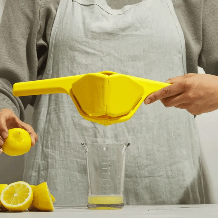 Fluicer is an easy squeeze citrus juicer that folds completely flat for space-saving storage. Two-handed sideways pivot operation provides increased leverage using the larger muscle groups of your arms instead of hands, requiring less effort than a traditional press.