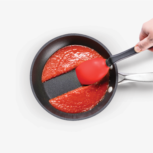 Supoon is the world’s best cooking spoon. It has a flat squeegee tip and flexible sides to scrape your pan or bowl clean, a deep scooping head, measures teaspoons and tablespoons, and its clever handle design is like having a built-in spoon rest so your Supoon’s head sits up off your bench. Color is red.