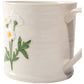 White ceramic mug with floral design on a white background