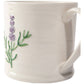 White mug with lavender and rosemary design on a white background