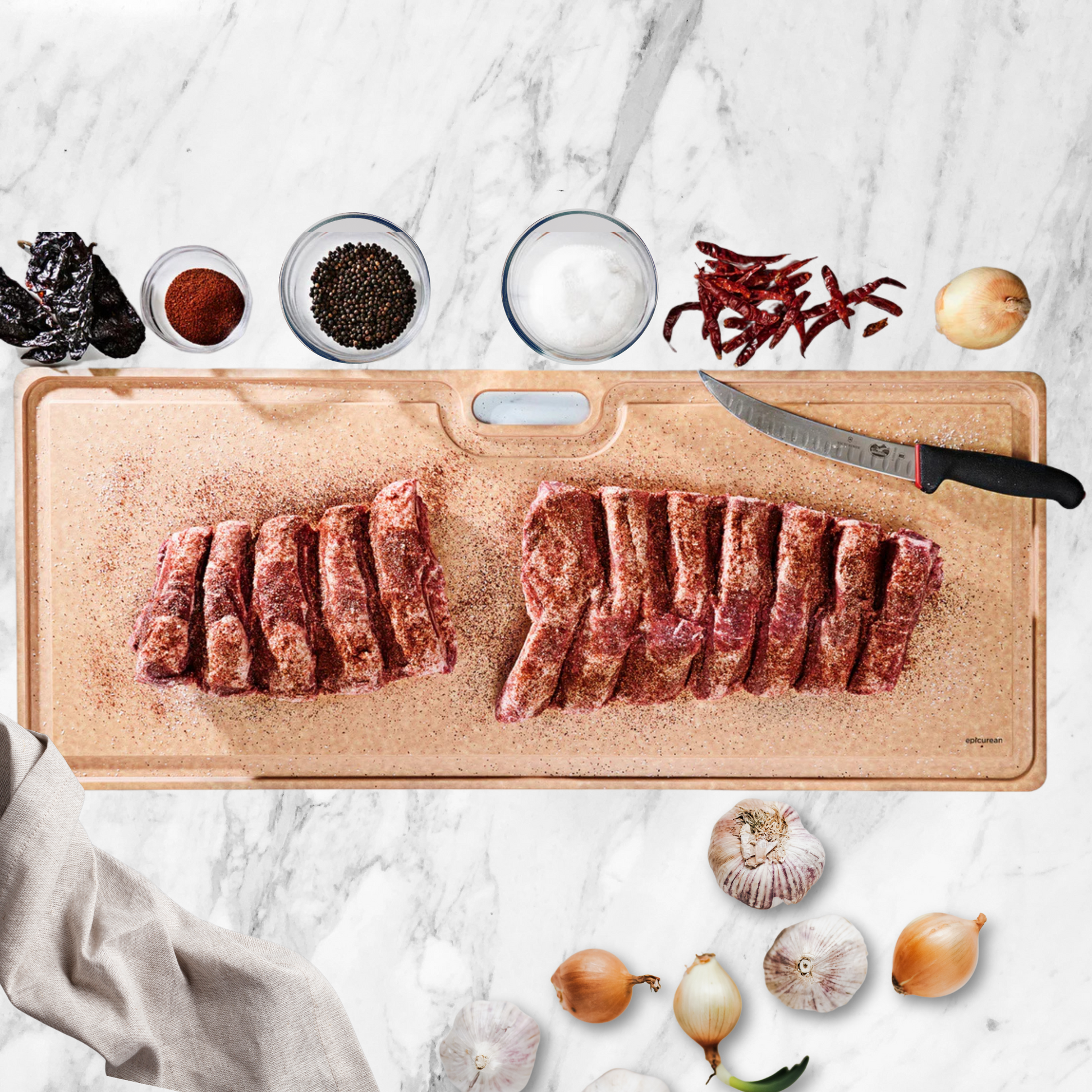 Go big or go home with the Epicurean Big Game and Butcher Board in a massive 35" x 14.5" size—perfect for handling oversized cuts, prepping party platters, or being the MVP at your next tailgate. 