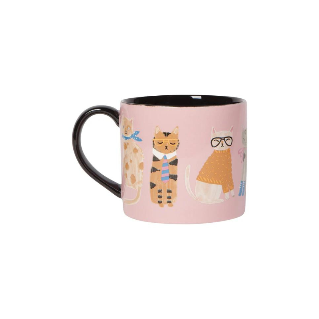 Feline Fine" Mug in a Box is purr-fectly charming! Featuring stylish cats rocking their stripes, spotted sweaters, and even cute boots, this mug is packed with personality. It comes in an adorable gift box