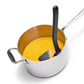 Stainless steel pot with black handle and yellow interior on a white background