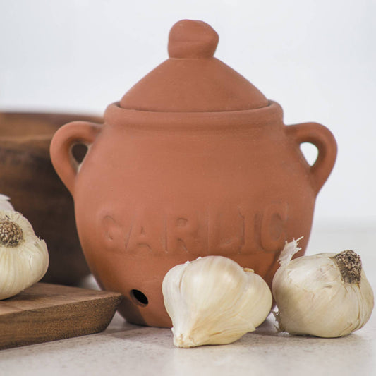 Keep your garlic fresh, organized, and protected with this elegant terra cotta garlic keeper. Made from porous, unglazed stoneware with vent holes, it promotes proper airflow to keep garlic cool, dry, and long-lasting.