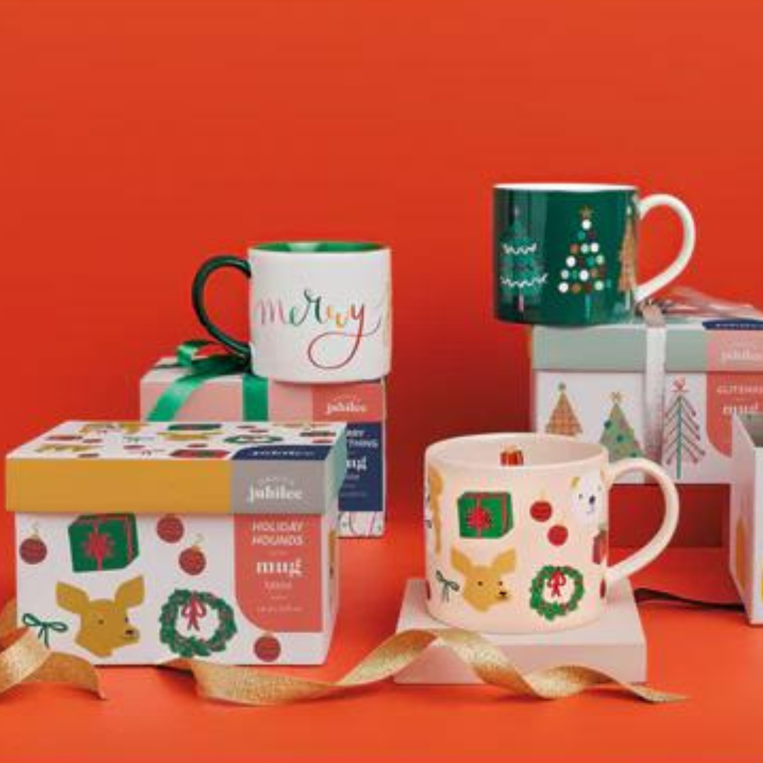 he Mug in a Box - Glitzmas from Danica Jubilee! This festive set invites you to sip in style with a stunning ceramic mug nestled in a gift-ready box. Adorned with dazzling holiday designs, this 14-ounce stoneware mug brings a touch of glitter to your holiday cheer, whether you're enjoying a cozy cocoa or a festive coffee. 