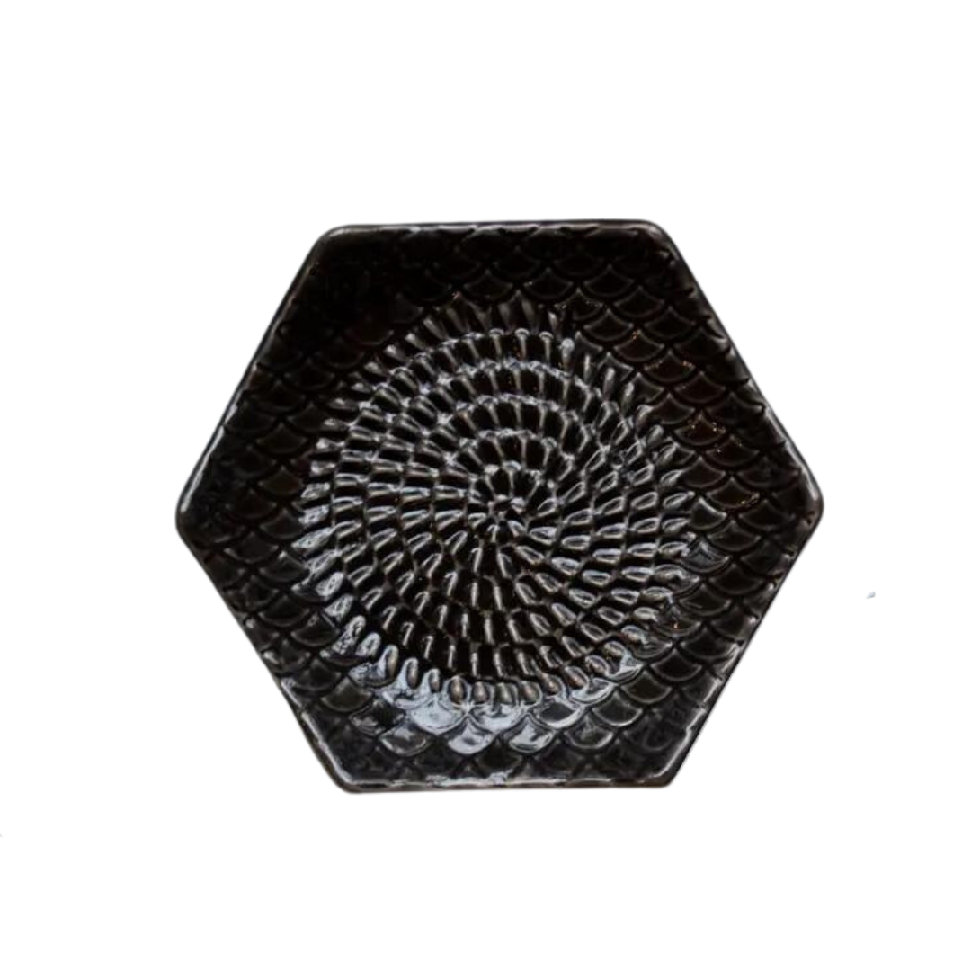 The Grate Plate is a ceramic grating plate used to grate garlic, ginger, peppers, nutmeg, chocolate, hard cheeses and much more! Perfect for adding fresh flavor to any dish. It's easy to clean and can be reused for an endless variety of culinary creations. Plus, the handy silicone garlic peeler and gathering brush make prepping fast and mess-free!