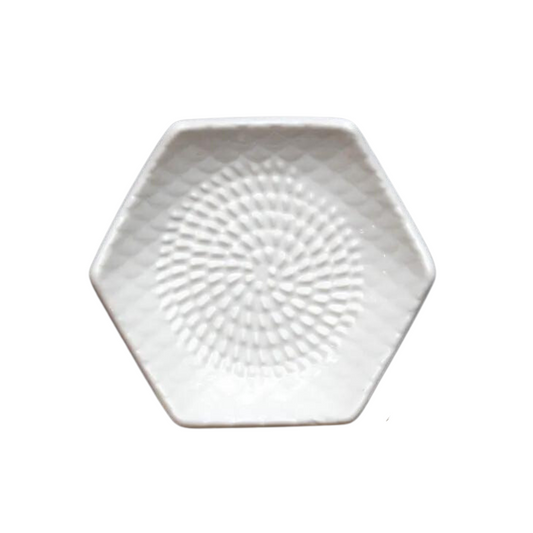 The grate plate is a ceramic grating plate used to grate garlic, ginger, peppers, nutmeg, chocolate, hard cheeses and much more! Perfect for adding fresh flavor to any dish. It's easy to clean and can be reused for an endless variety of culinary creations. Plus, the handy silicone garlic peeler and gathering brush make prepping fast and mess-free!