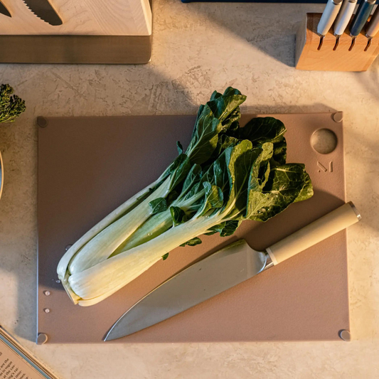 All of the grip, none of the slip.&nbsp;Featuring silicone pop corners, this is one cutting board that won't budge making it a must-have for slick countertops (we're looking at you, marble) and vigorous choppers. The latest addition to our award-winning reCollection, these BPA-free cutting boards are made from recycled kitchen scraps and renewable sugarcane.