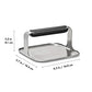 Stainless Steel grill press with measurements displayed. 
