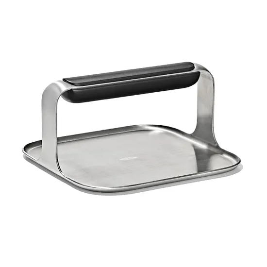 A stainless steel grill press black rubberized grip on a white background.
