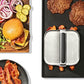 Top down view of a metal grill press being used to cook backon a a griddle. 