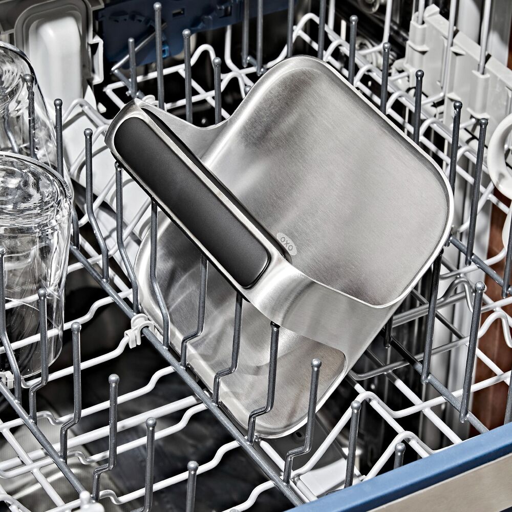 Metal griddle press in dishwashers top rack. 