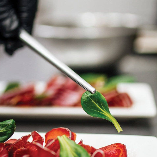 Dolci's product on a plate with a close-up of a leaf