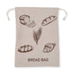 Beige bread bag with illustrations of bread and the word 'Bread Bag' on a white background