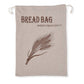 Bread bag with wheat design and text on a beige background