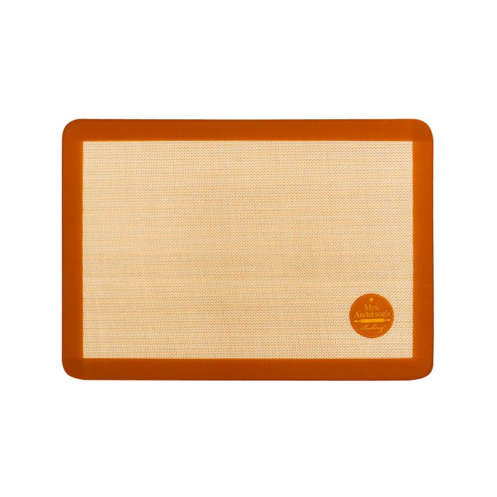 Brown silicone baking mat on a white background