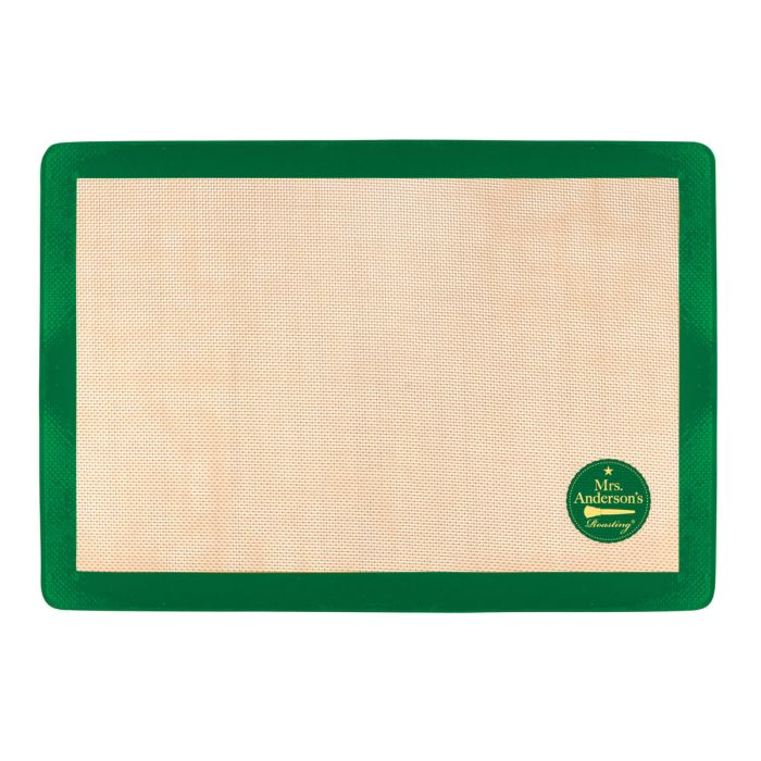 Green silicone baking mat on a white background