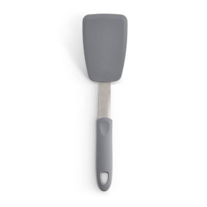Gray silicone spatula on a white background