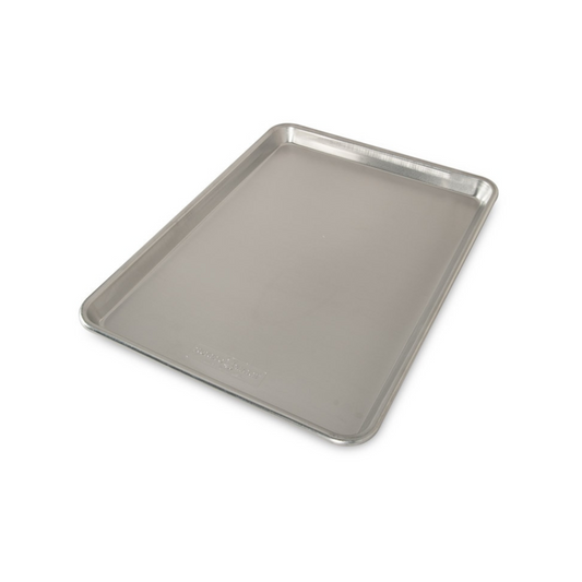 The Nordic Ware Baker's Half Sheet is an essential tool in the kitchen you will use in many different ways. From sheet pan dinners and baked goods to food prep, our top-rated Naturals® Bakeware collection is made of pure aluminum for superior heat conductivity and produces consistently evenly browned baked goods every time. These premium pans have lifetime durability and will never rust. 