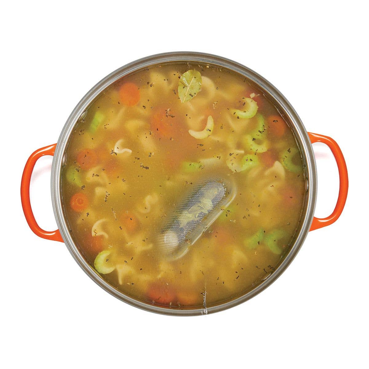 Pasta soup in a pot with orange handles on a white background