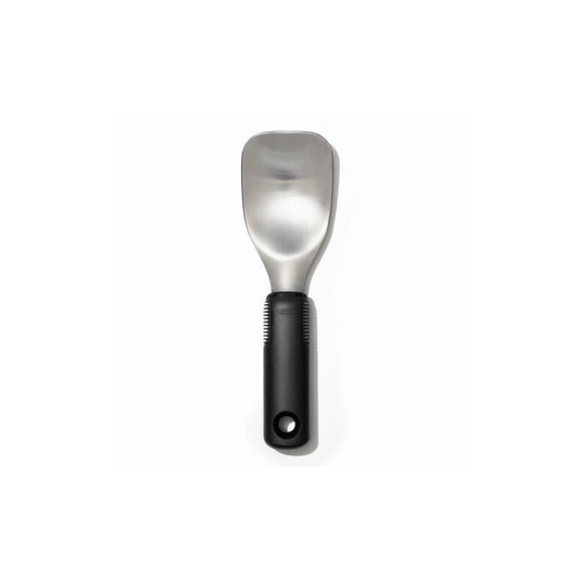 Revolutionize your ice cream serving experience with the OXO Good Grips Ice Cream Spade, expertly engineered for effortless scooping and generous portions. The wide stainless steel head slices through frozen desserts with remarkable ease while maintaining the durability needed for repacking store-bought pints. 