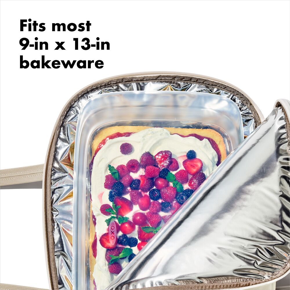 insulated bakeware carrier open showing it fits 9 x 13 bakeware. 