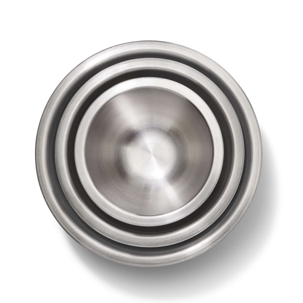 Top down of silver mixing bowls stacked. 