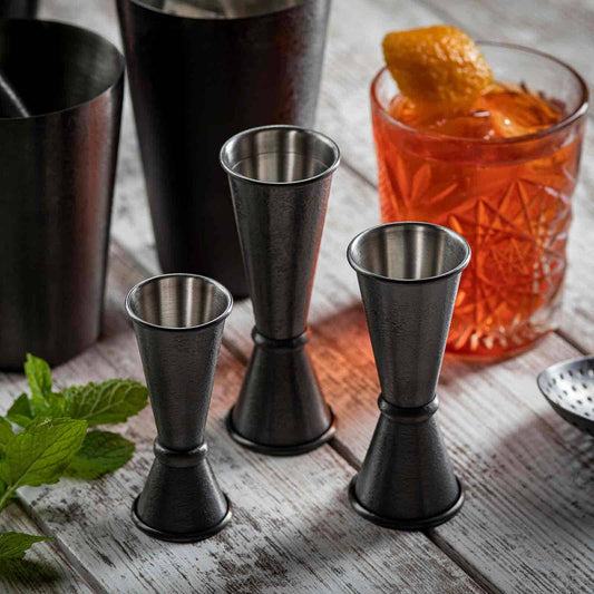  Crafted from sleek stainless steel with a chic black PVD coating and a striking Random Acid Etch finish, this jigger adds a touch of sophistication to any bar setup. 