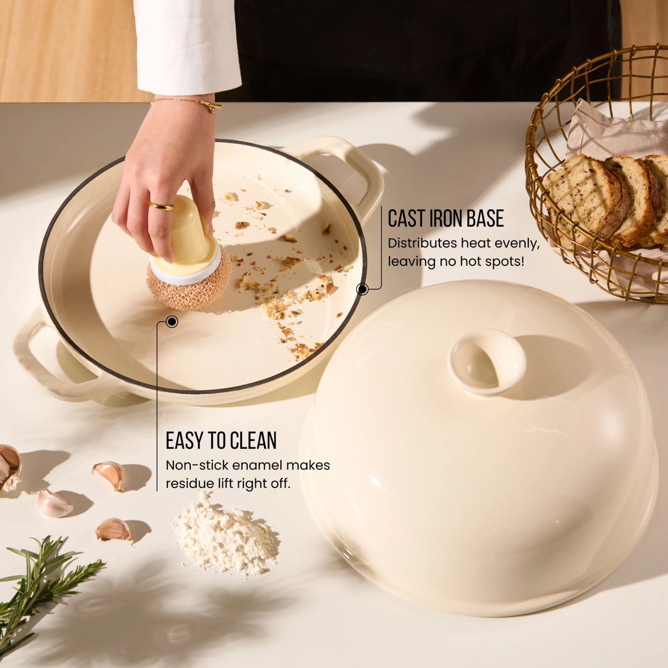 Beige ceramic dish with lid on a light surface, hand cleaning inside the dish.