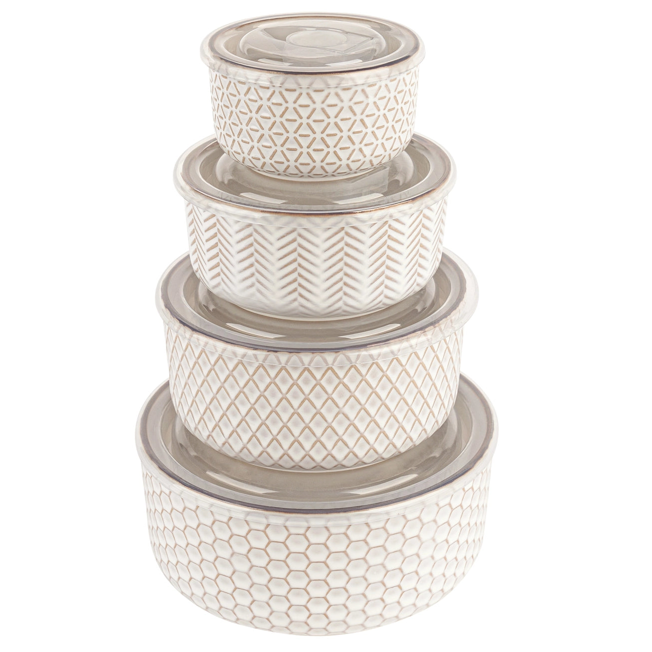 A set of four nested glass storage containers with lids, featuring textured patterns of honeycomb, diamond, herringbone, and chevron in a warm cream and beige color palette.