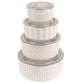 A set of four nested glass storage containers with lids, featuring textured patterns of honeycomb, diamond, herringbone, and chevron in a warm cream and beige color palette.
