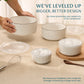 Set of ceramic bowls with geometric patterns on a beige surface, with text about improved design.