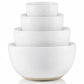 A set of four nested ceramic bowls in white with subtle gray speckles and a natural beige base, shown on a clean white background.