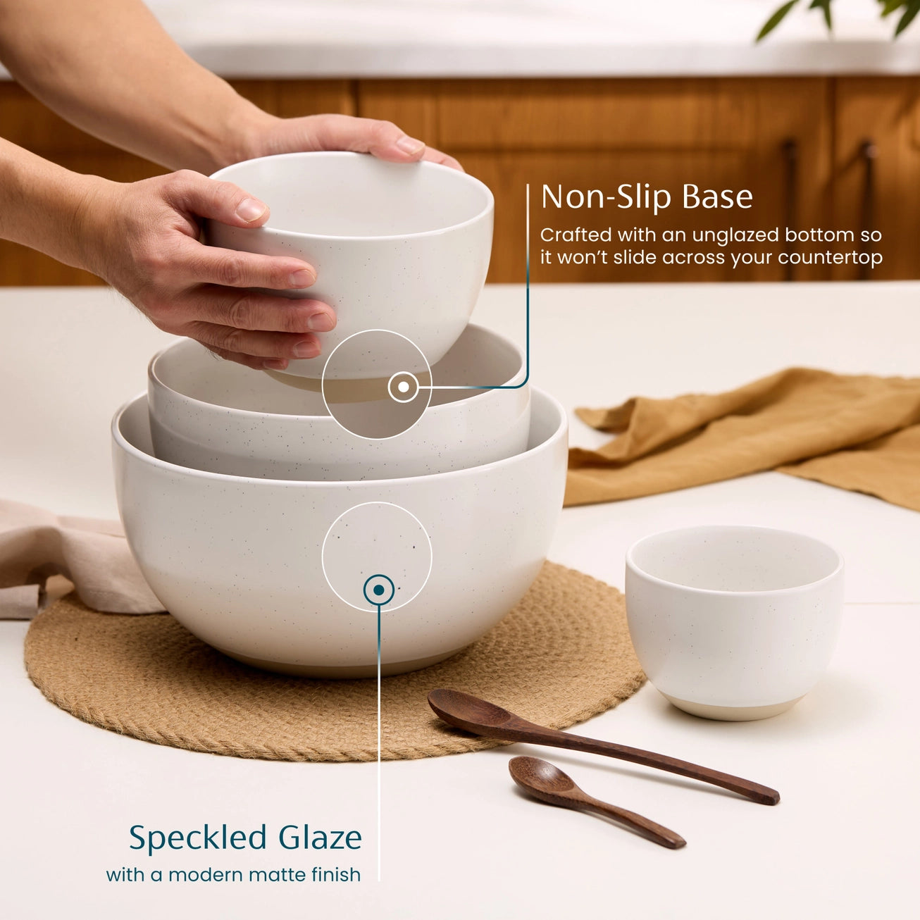 White ceramic bowls with non-slip base feature on a kitchen counter.